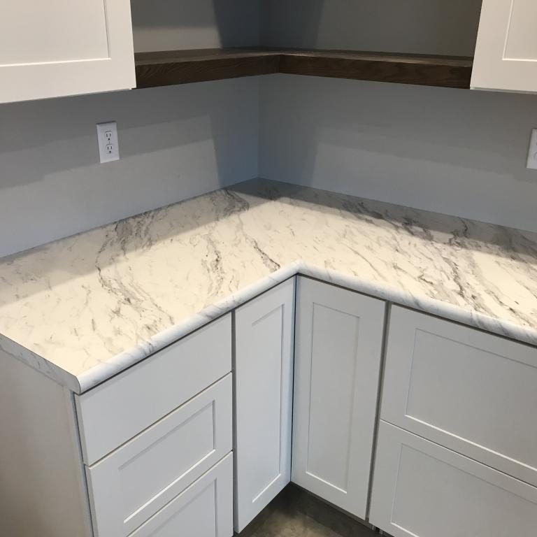 Calcutta Marble (Wilsonart) - Crescent Edge Moulding